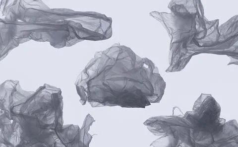 Multiple plastic clouds floating across grey background for climate polluti.. Foto stock