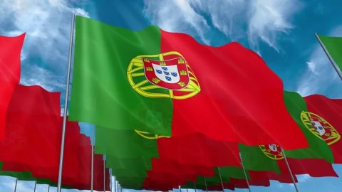 Multiple Portugal flags seamless looping waving on blue sky Stock Footage 343683966
