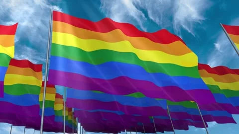 Multiple Pride flags seamless looping waving on blue sky Stock Footage 343683961