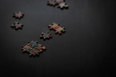 Multiple puzzle pieces Foto stock