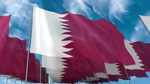 Multiple Qatar flags seamless looping waving on blue sky Stock Footage 343683993