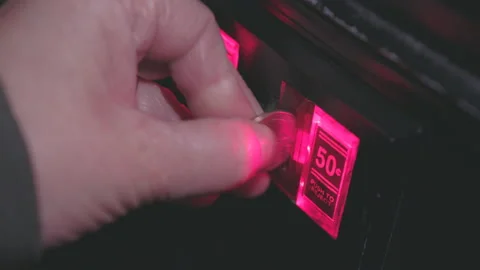 Multiple quarters inserted into coin mechanism arcade 4k 스톡 동영상 155207107