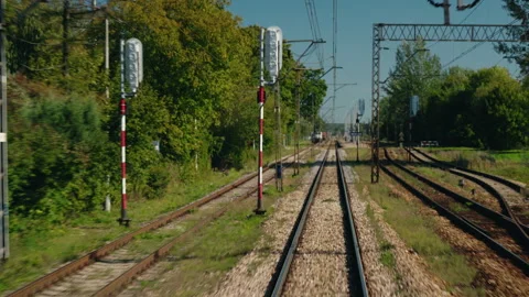 Multiple Railway Tracks Converging Beneath Overhead Electrification Stock Footage 346764685