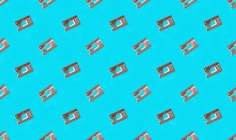 Multiple razors on a bright blue background pattern Stock Photos