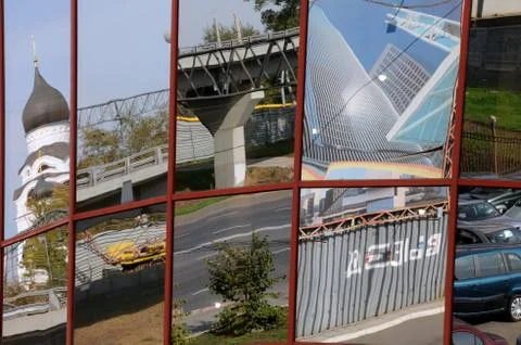 Multiple reflections in the building windows Stock Photos