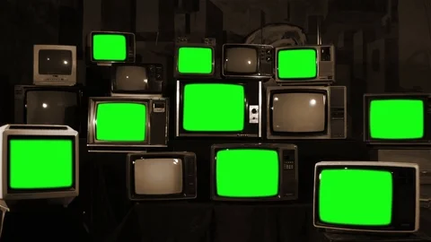 Multiple Retro TVs turning on Green Screens. Sepia Tone. Stock Footage 90739237