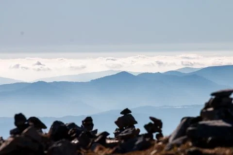Multiple rock stacks on the mountain range of Tatra at sunrise. Poland. The W Foto stock