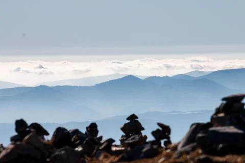 Multiple rock stacks on the mountain range of Tatra at sunrise. Poland. The W Stock Photos
