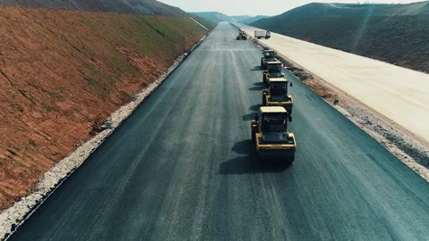 "Multiple Rollers in Roadwork Operation" Stock Footage 306023092
