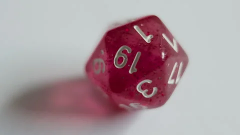 Multiple Rolls of Red D20 Dice on Tabletop Surface Stock Footage 331915498