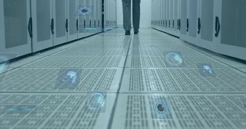 Multiple round scanners against mid section of man walking in computer server Foto stock