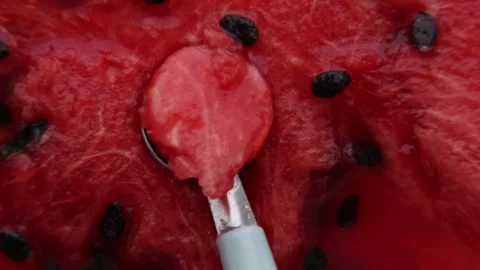 Multiple scooping actions in juicy watermelon ASMR meditation Stock Footage 313830960