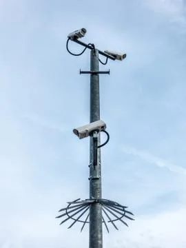 Multiple security cameras on a pole Stock Photos