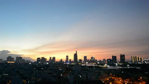 Multiple shade of sunset over Ho Chi Minh City Center Skyline Stock Footage 156269577