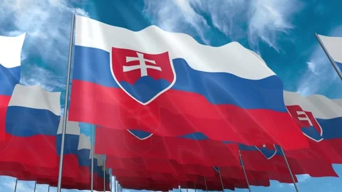 Multiple Slovakia flags seamless looping waving on blue sky Stock Footage 343684537