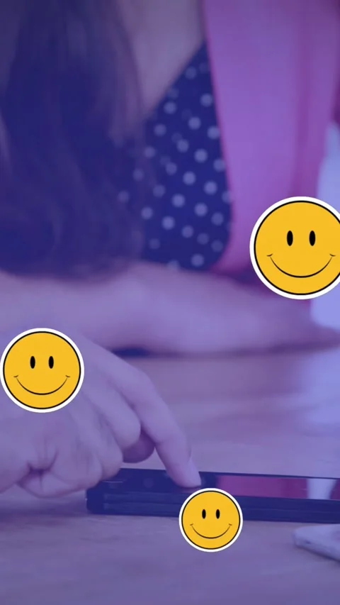 Multiple smiley face emojis floating against mid section of people using Vídeo Stock 341918791