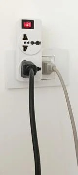 Multiple socket outlets, electrical equipment, wires and power strips 스톡 사진