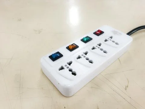 Multiple socket plug. old movable electric plug with separate switch for each Stock Photos