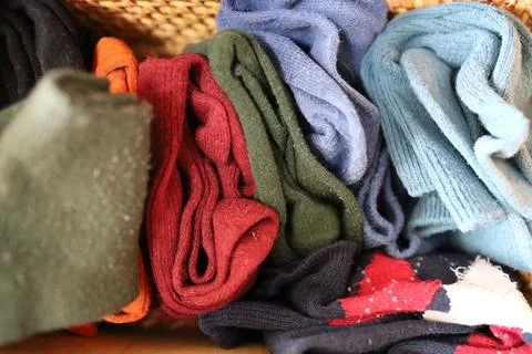 Multiple socks folded and stored in a box. Stock Photos