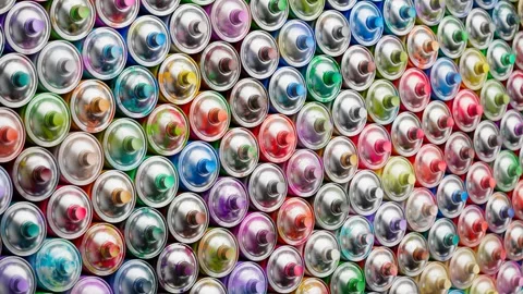 Multiple spray paint cans stacked in a pattern. Infinite looping animation. 4KHD Video stock 201118040