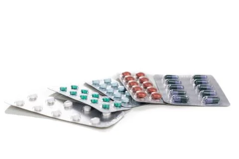 Multiple strips of pills tablet, caplet, capsule. Medication for various dise Stock Photos