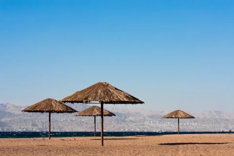 Multiple sunshades on a beach Stock Photos