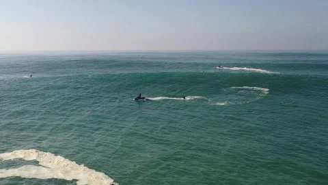 Multiple Surfers Surfing Big Wave Drone Aerial Nazare Portugal  Видео 275412643