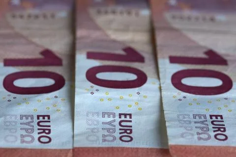 Multiple ten euro notes symbolizing European financial system Stock Photos