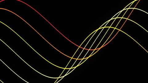 Multiple thin yellow, orange, red, and pale green waves cross a black field.. Stock Illustration