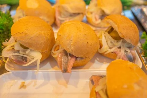 Multiple traditional fish rolls prepared for customers at a fair Foto stock