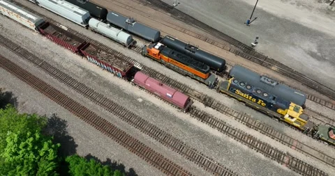 Multiple trains parked on multiple tracks Stock Footage 335669841