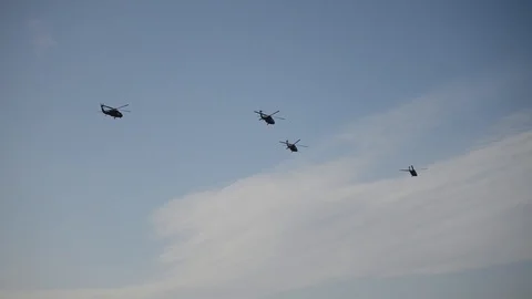 Multiple UH-60 Black Hawk helicopters in flight Stock Footage 102944436