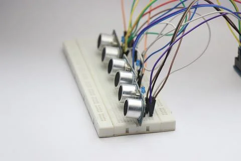 Multiple ultrasonic sensors on breadboard connected via jumper cables Stock Photos
