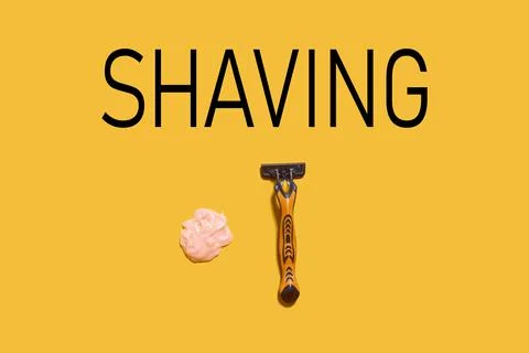 A multiple use shaving razor and cream Stock Photos