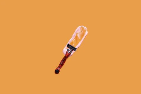 A multiple use shaving razor and cream Stock Photos