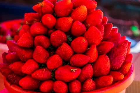 Multiple views of a pile of strawberries Stock Photos