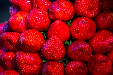 Multiple views of a pile of strawberries Stock Photos
