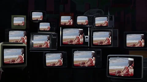 Multiple Vintage CRT TVs Stacking Wall Showing Apollo 11 Rocket Launch 4K Stock Footage 335475447