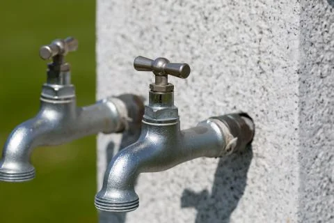 Multiple water taps Stock Photos