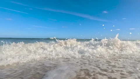 Multiple waves crash over camera lens on Fort Lauderdale beach Video stock 281787575
