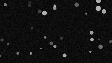  Multiple white glowing bokeh circles on black grainy static texture 库存影片 336159821