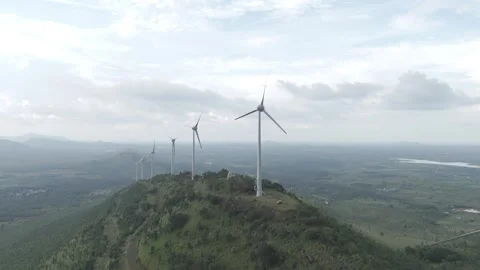 Multiple wind turbines generating renewable energy Stock Footage 302265686