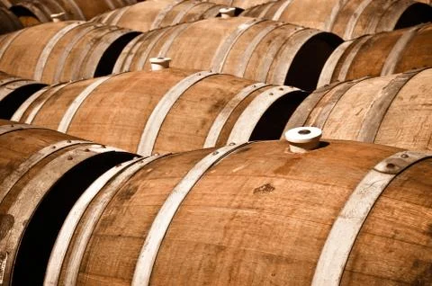 Multiple wine barrels in a cellar Foto stock