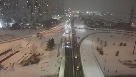 Multiple Winter Service Vehicles Plowing Streets at Night, Aerial Shot Stock Footage 311366505