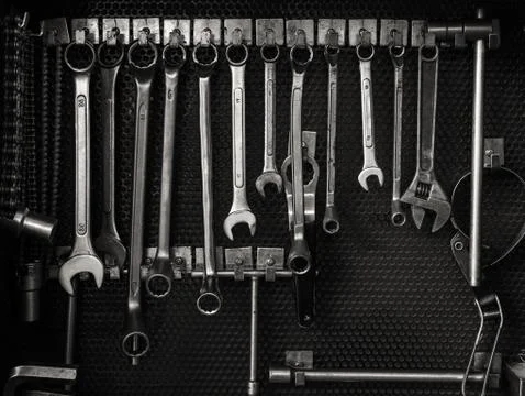 Multiple wrenches hanging on tool board Stock Photos