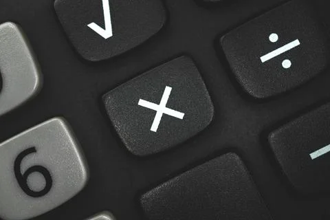 Multiply button with sign amd symbol close up, calculator close up Stock Photos