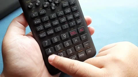 Multiplying a number by zero on a calculator	 Stock Footage 285910820