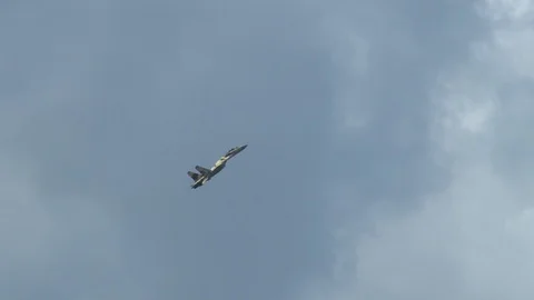 Multipurpose fighter Su-35 (Flanker-E)  performs aerobatics at minimum speed. Stock Footage 115394963
