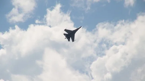 Multipurpose fighter Su-35 (Flanker-E) performs aerobatics. Stock Footage 118959272