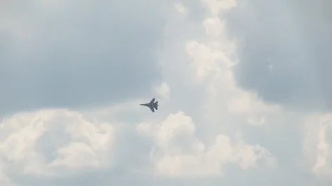 Multipurpose fighter Su-35 (Flanker-E) performs aerobatics. Stock Footage 118959426